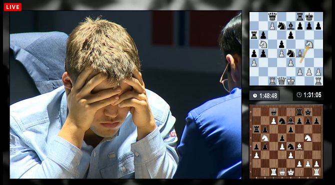 Carlsen réfléchit 3eme partie du match